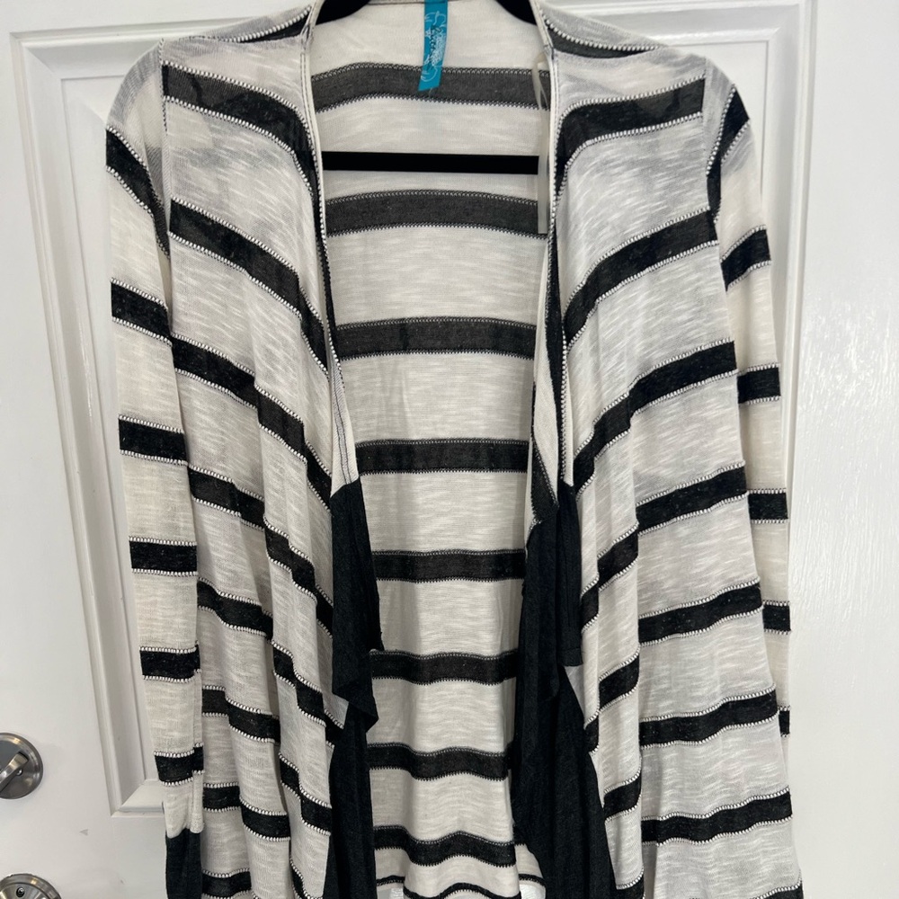Cardigan, cream with black stripe.